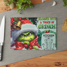 Load image into Gallery viewer, Grinch Holiday Glass Cutting Board — "Seasoned With A Touch of Grinch" Kitchen Decor
